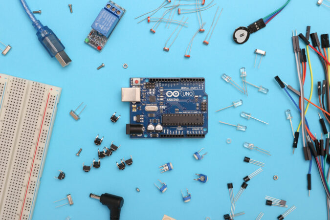 A microchip surrounded by other components and tools