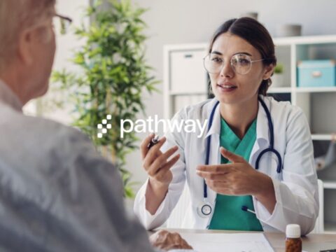 A doctor talking to a patient. The pathway logo is on top of the entire image.